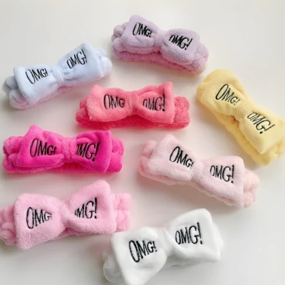 Soft elastic OMG bow headbands in seven colors for beauty routines and facials in Pakistan