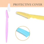 Close-up of Tinkle eyebrow razor blade with stainless safety cover
